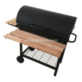 Barbecue me qymyr druri në kazan